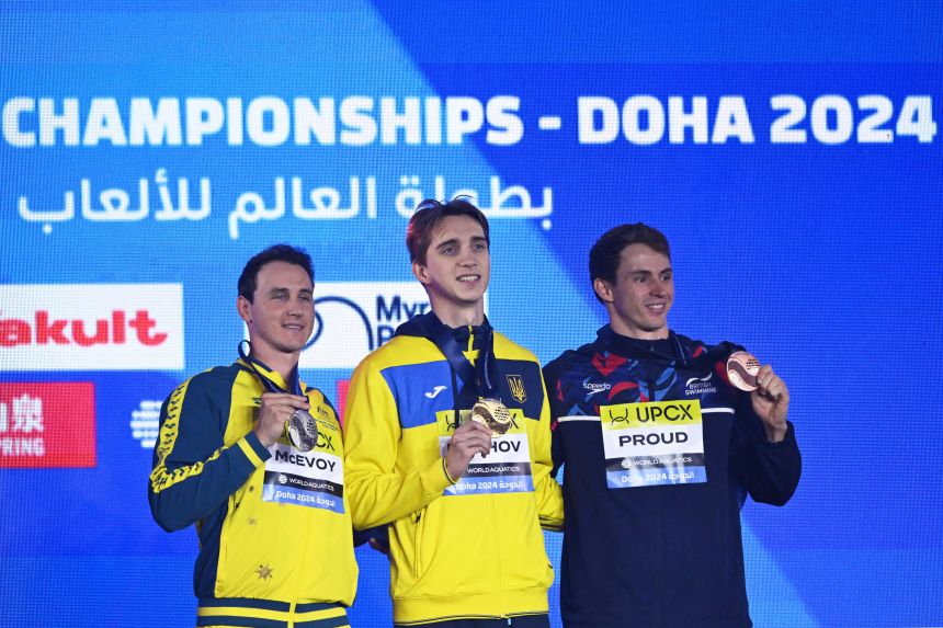 Bukhov (C) beat out former world champions Cameron McEvoy (L) and Benjamin Proud (R) to win gold in Doha last year.