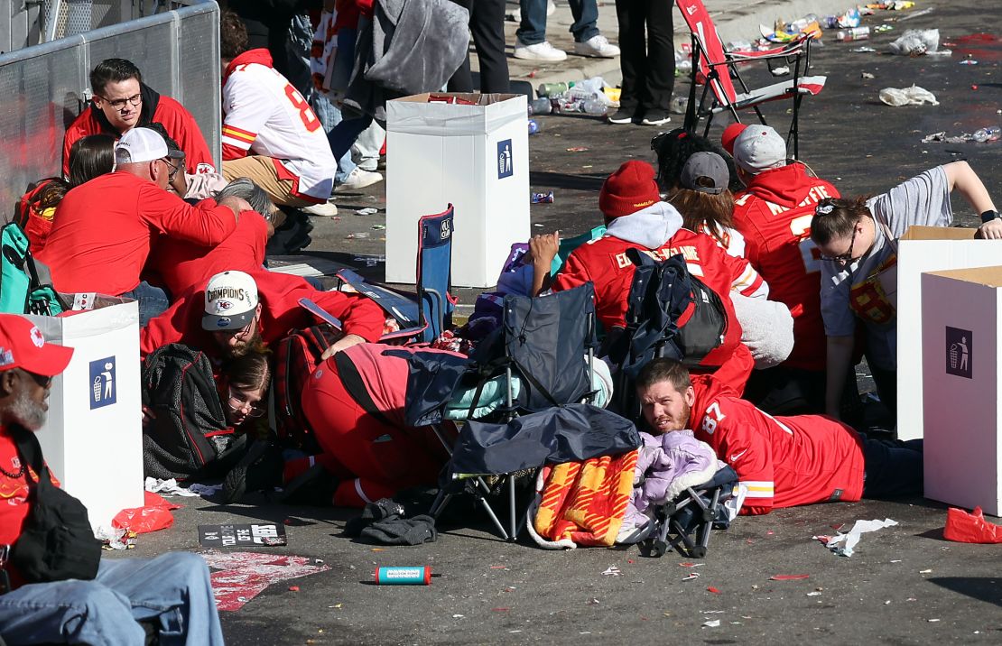 People take cover as shots ring out near Union Station during the Chiefs victory festivities.