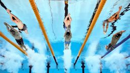 (L-R) Alessandro Miressi of Team Italy, Zhanle Pan of Team People's Republic of China and Sunwoo Hwang of Team Republic of Korea compete in the Men's 100m Freestyle Final on day fourteen of the Doha 2024 World Aquatics Championships at Aspire Dome on February 15, 2024 in Doha, Qatar. (Photo by Adam Pretty/Getty Images)