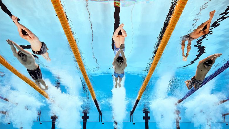 (L-R) Alessandro Miressi of Team Italy, Zhanle Pan of Team People's Republic of China and Sunwoo Hwang of Team Republic of Korea compete in the Men's 100m Freestyle Final on day fourteen of the Doha 2024 World Aquatics Championships at Aspire Dome on February 15, 2024 in Doha, Qatar. (Photo by Adam Pretty/Getty Images)