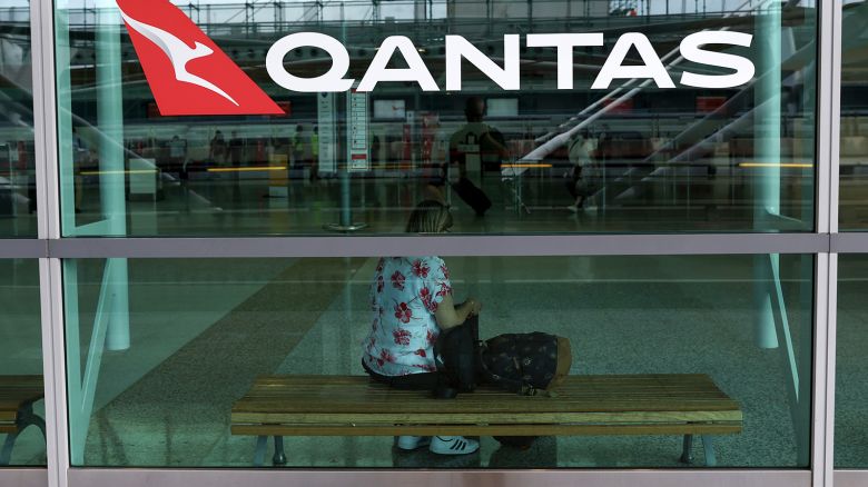 Qantas Airways Ltd. signage at Sydney Airport in Sydney, Australia, on Tuesday, Feb. 20, 2024.
