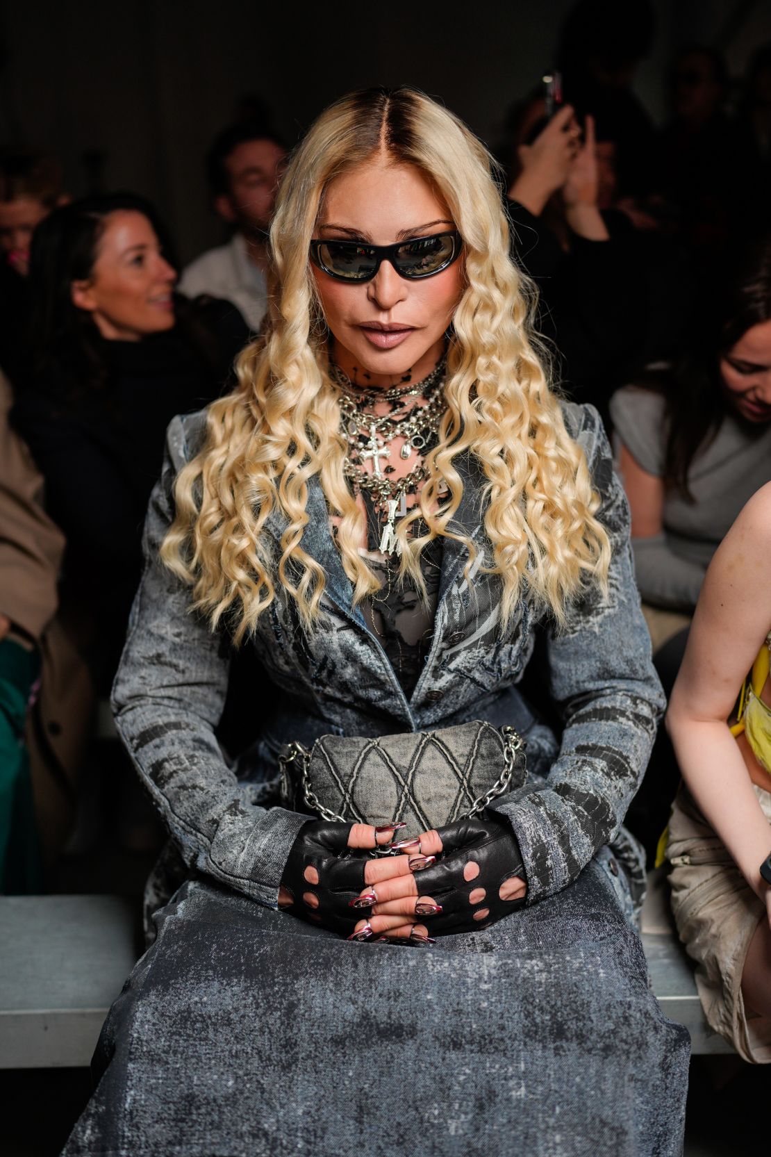 Stone has appeared under the guise of Madonna, pictured on the front row of the Diesel show at Milan Fashion Week...