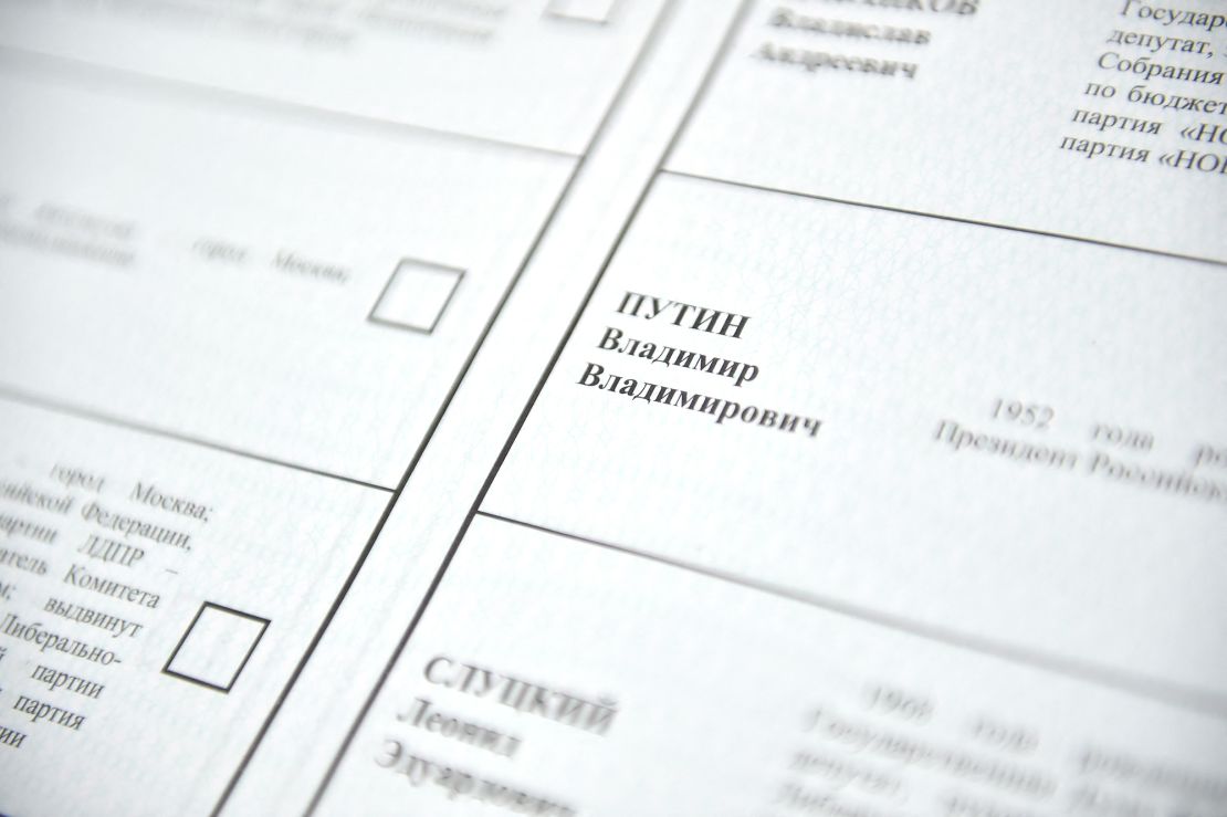 Ballot papers bearing Putin's name are prepared ahead of the election.