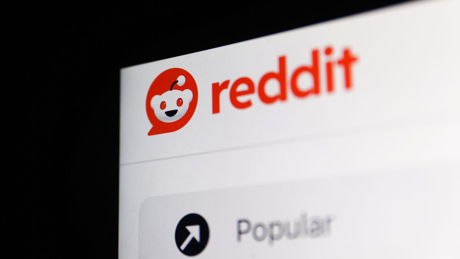 Reddit's logo on website displayed on a laptop screen is seen in this illustration photo taken in Krakow, Poland on February 22, 2024.
