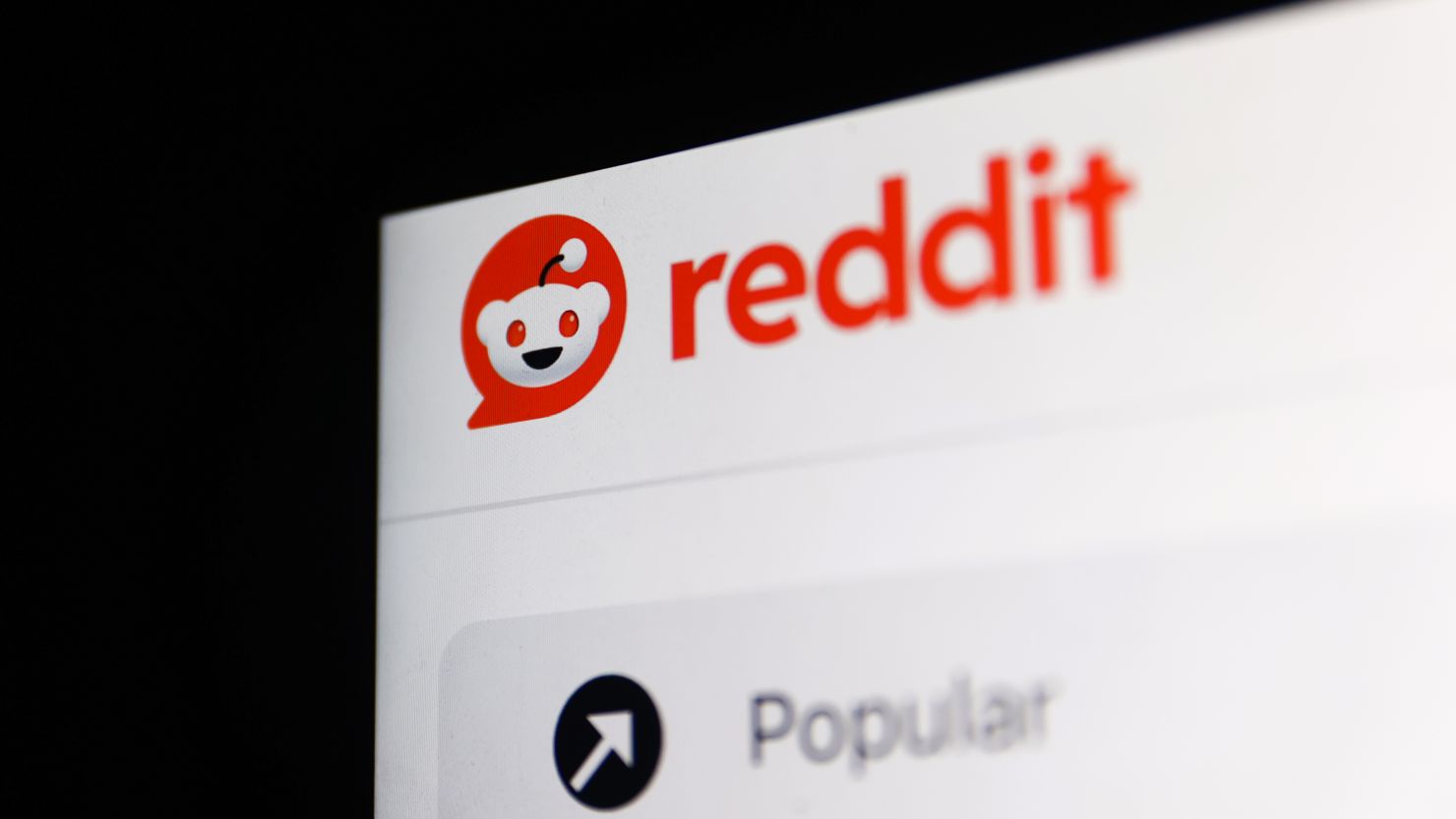 Reddit logo on the website displayed on a laptop screen. Reddit on Thursday filed to go public, nearly 20 years after its launch.