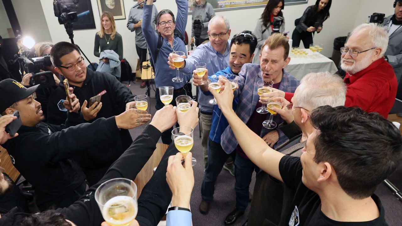 Markus Rufer, President and CEO of Scorpius, and team members celebrate as the Spacecraft Odysseus lands on the moon from Scorpius Space Launch Company in Torrance, California, on February 22, 2024. The Intuitive Machines Nova-C class lunar lander, powered by SSLC propellant tanks, is bound for the moon, where it will attempt to land near the south pole on February 22 and carry out experiments that pave the way for the return of US astronauts later this decade. (Photo by David SWANSON / AFP) (Photo by DAVID SWANSON/AFP via Getty Images)