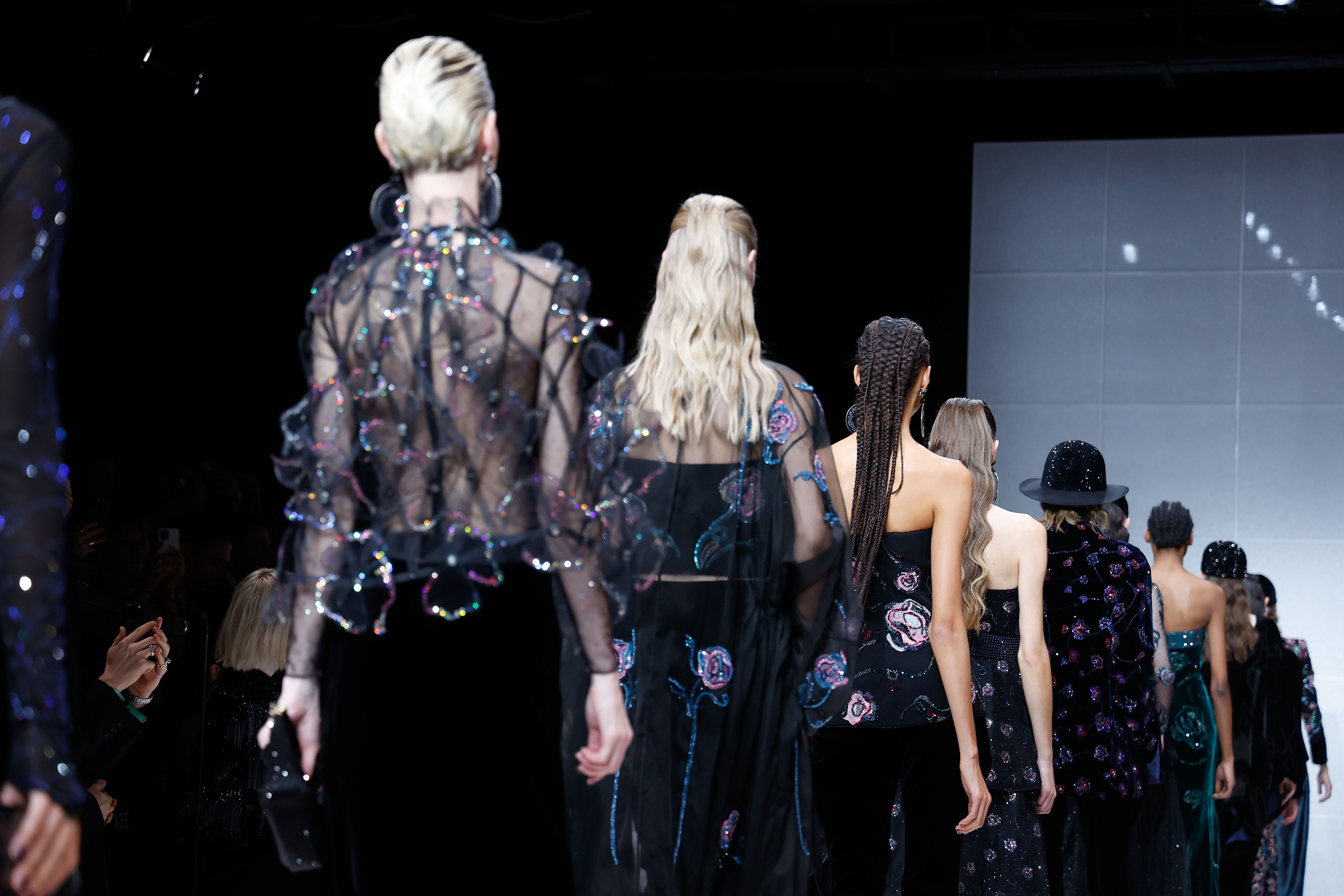 Dark shades with delicate bejewelled embellishments on the runway at Giorgio Armani.