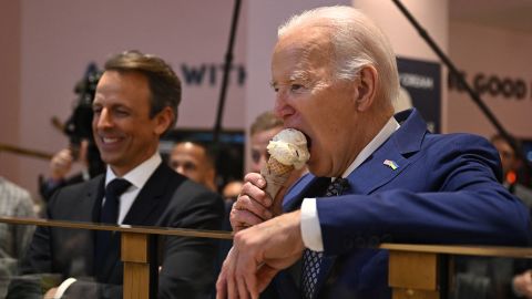 President Joe Bideeats an ice cream cone at Van Leeuwen Ice Cream after taping an episode of "Late Night with Seth Meyers" in New York City on February 26.