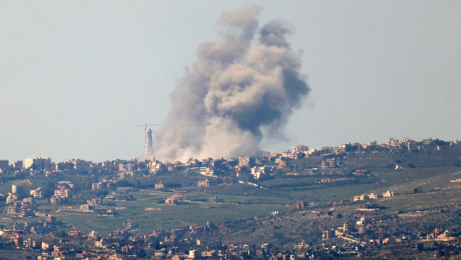 This picture taken from Israel along the border with southern Lebanon shows smoke billows above the Lebanese village of Bint Jbeil during Israeli bombardment on February 28.