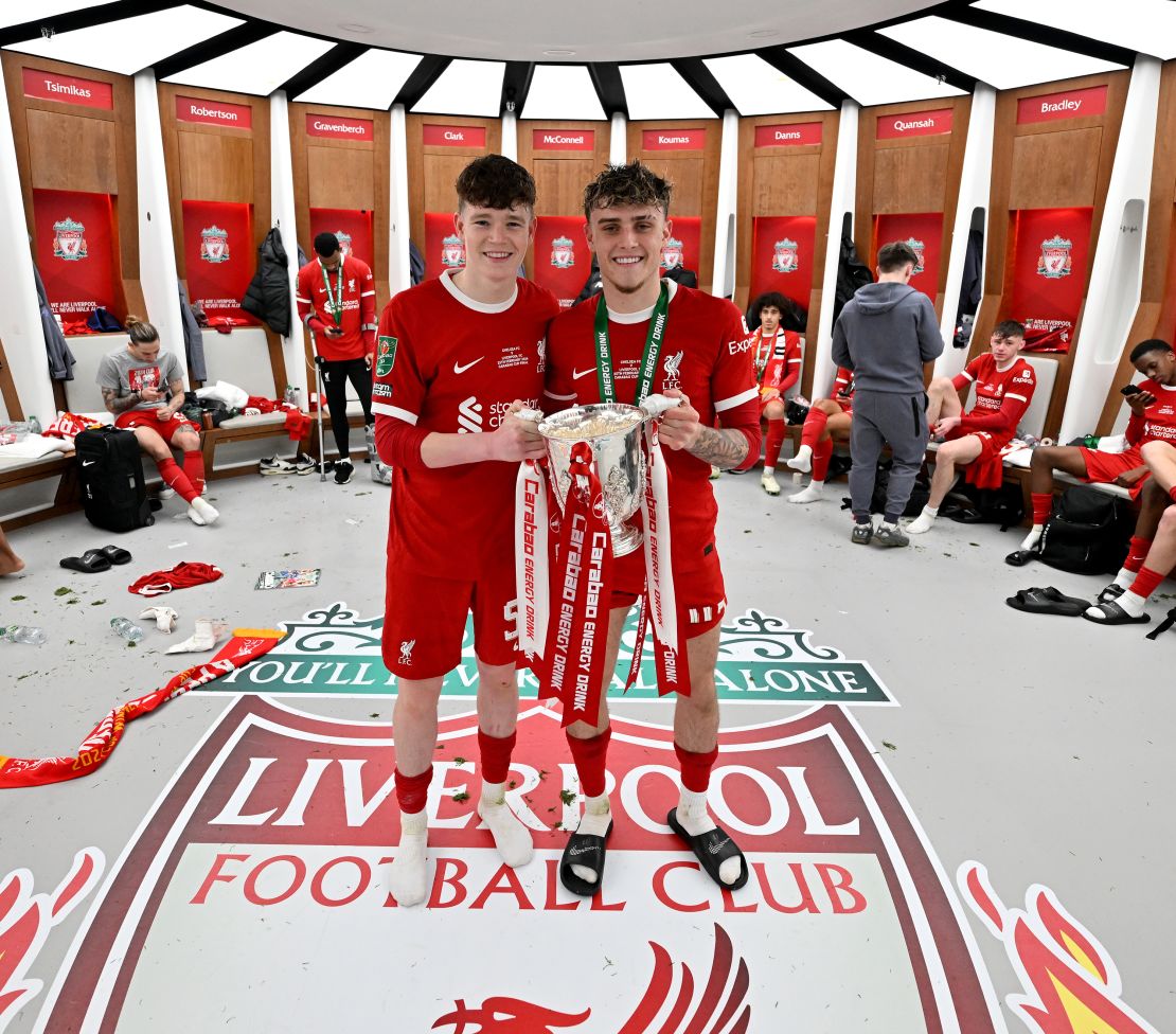 James McConnell (left) and Bobby Clark (right) celebrate with the Carabao Cup after Liverpool beat Chelsea in the final of the competition.