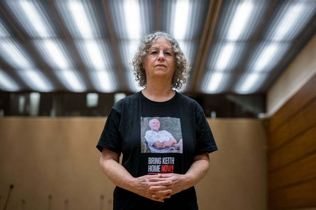 Former Hamas hostage Aviva Siegel wears a T-shirt showing a her husband Keith during her visit to the UN Human Rights Council in Geneva on February 28, 2024. Aviva Siegel was released on November 26, 2023.