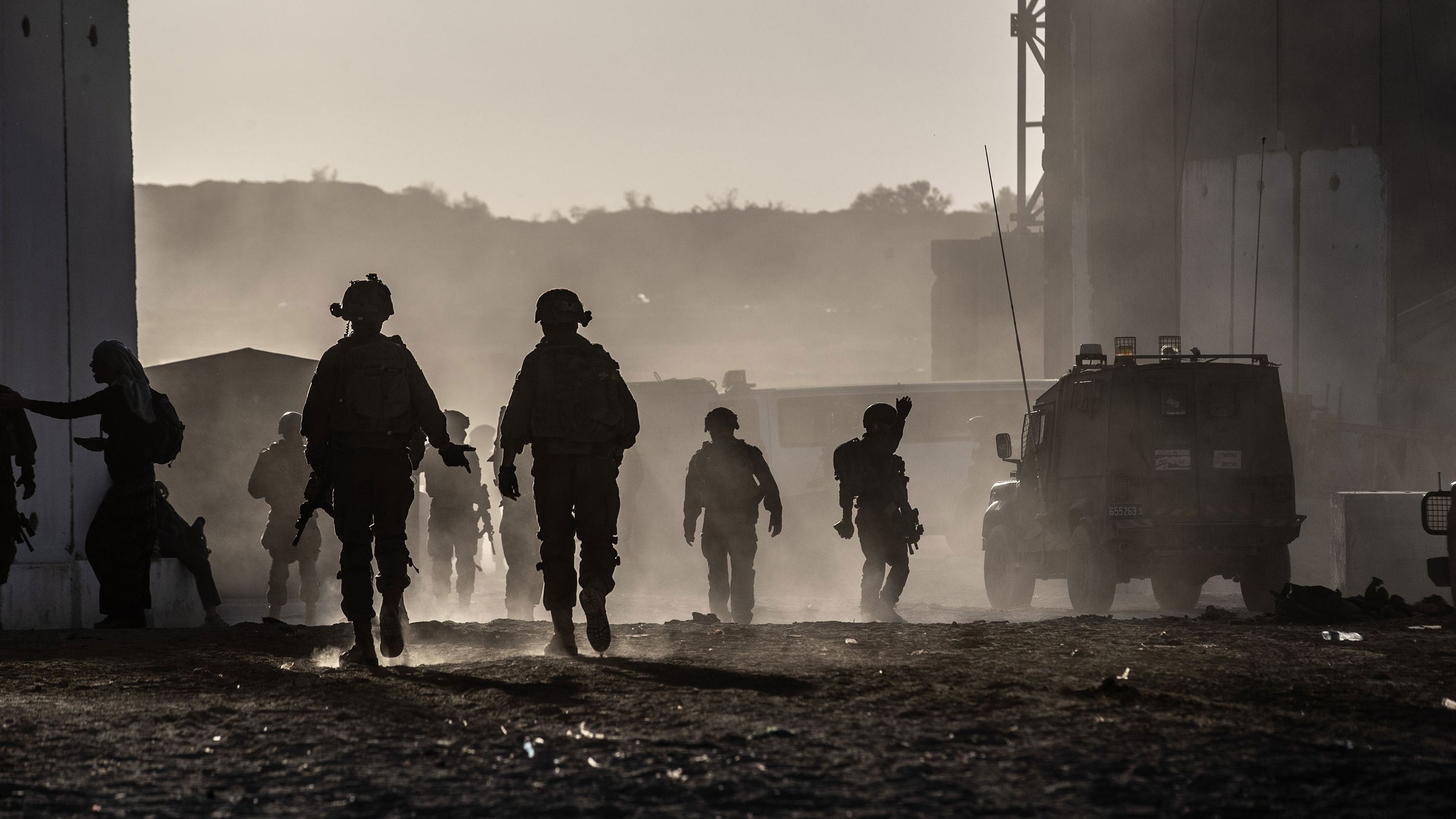 Israeli soldiers deployed at the Erez border with heavy weapons and military vehicles on February 29, 2024.