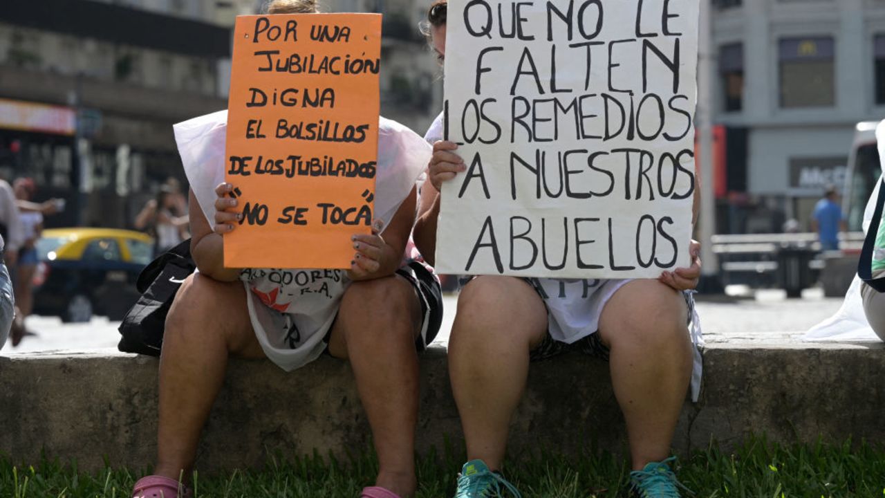 Retirees took part in a demonstration from the Obelisk to the PAMI (Comprehensive Medical Attention Program), the public health insurance agency in Buenos Aires, on February 21, 2024, in the hope of restoring the delivery of free medicine that was interrupted with the start of the new government of Argentine President Javier Milei. In Argentine pharmacies, people check the price of medicine and do not buy it, even antibiotics. The drop in sales of 10 million units in January, 70% in prescriptions, reveals another side of the crisis where health care has become a luxury. "Between eating and buying the medicine, people choose to eat," reasons pharmacist Marcela Lopez behind the counter of a pharmacy in Buenos Aires. Those who cannot afford an antibiotic cope with the pain with ibuprofen. (Photo by JUAN MABROMATA / AFP) (Photo by JUAN MABROMATA/AFP via Getty Images)