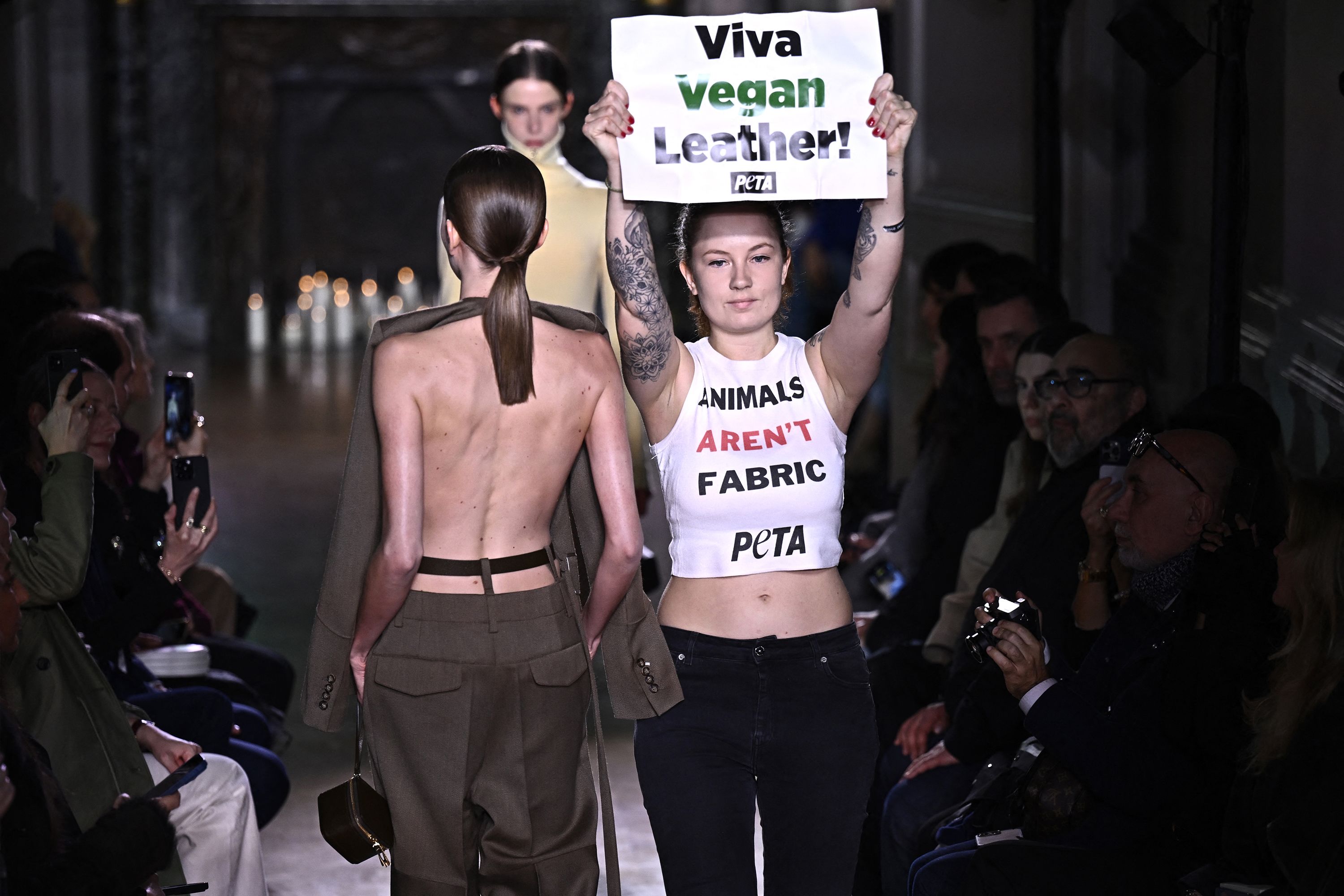Victoria Beckham Wore a Button Down Utility Dress in Paris