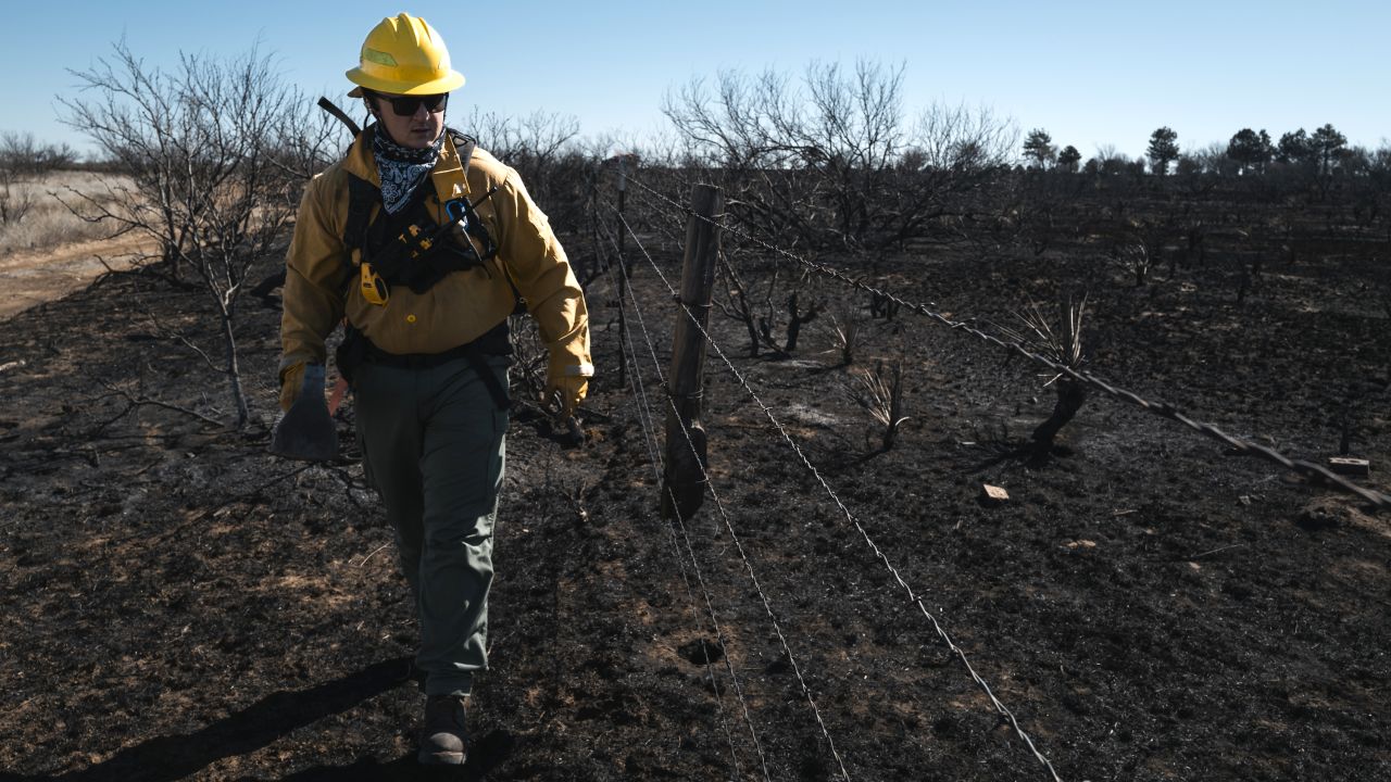 Fire crews work to extinguish hot spots following the Smokehouse Creek Fire in Fritch, Texas, US, on Friday, March 1, 2024. Texas GovernorÂ Greg AbbottÂ said as many as 500 structures such as houses and barns have been damaged or destroyed in the largest wildfire in state history.