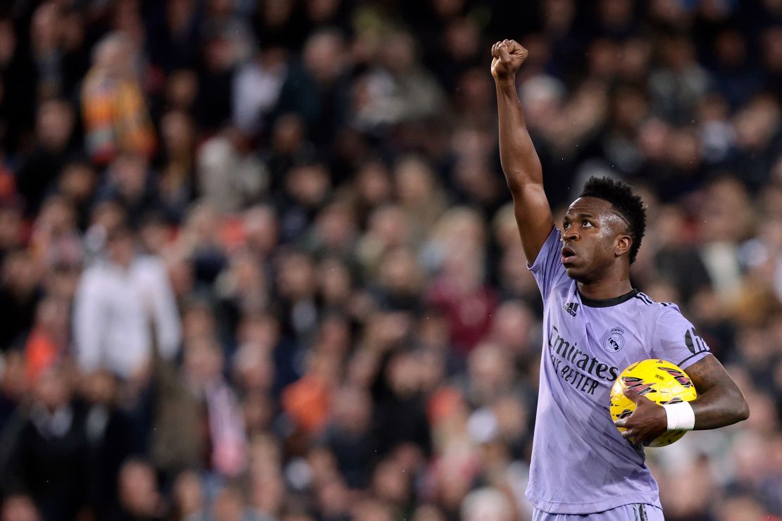 Vinícius celebrates scoring against Valencia.