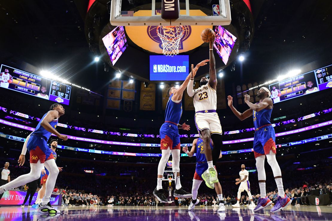 LeBron James #23 of the Los Angeles Lakers scores his 40,000th career point during the game against the Denver Nuggets.