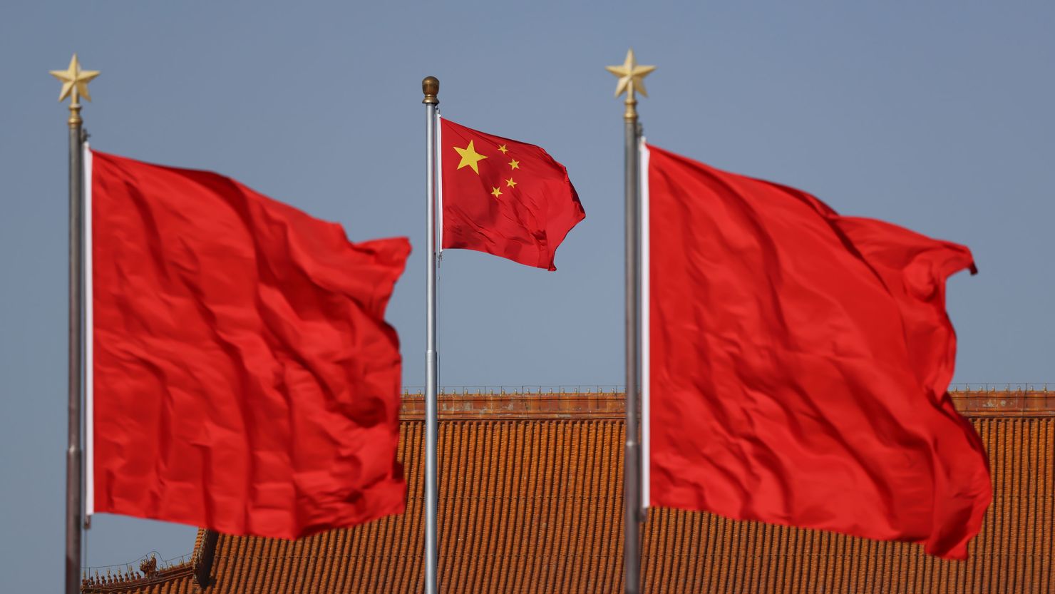 Chinese national flags flutter at Tiananmen square ahead of the annual two sessions on February 29, 2024 in Beijing, China.