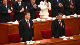 Chinese leader Xi Jinping (left) and Premier Li Qiang (right) at the opening session of the National People's Congress in Beijing on March 5.