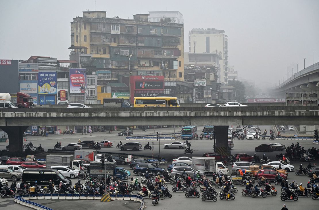 Vehicles drive amid high levels of air pollution in Hanoi, Vietnam, on March 5, 2024.