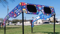 The City of Dripping Springs, Texas is preparing for the solar eclipse with a set of larger than life glasses on display at Veterans Memorial Park on March 5, 2024. Millions of people across the United States are preparing to watch April's total solar eclipse.