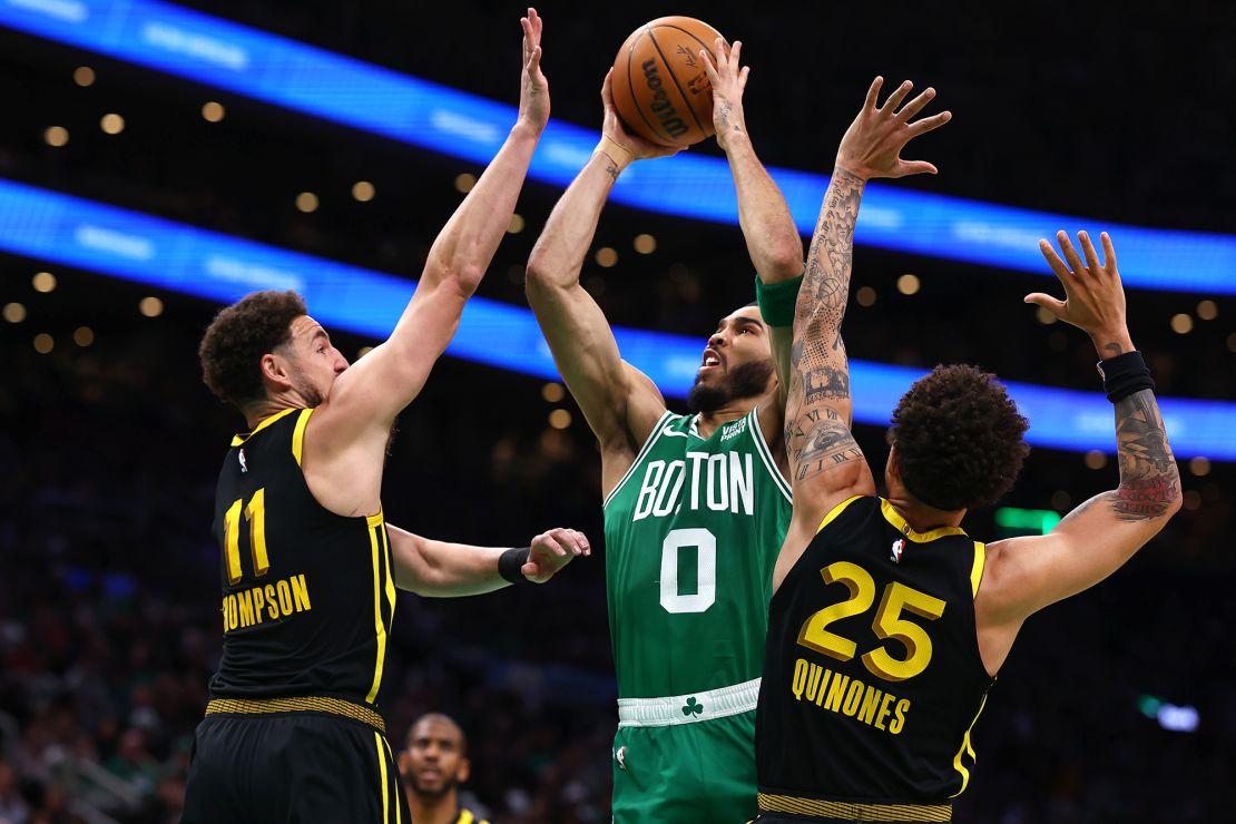 Boston's Jayson Tatum drives to the bucket during the game.