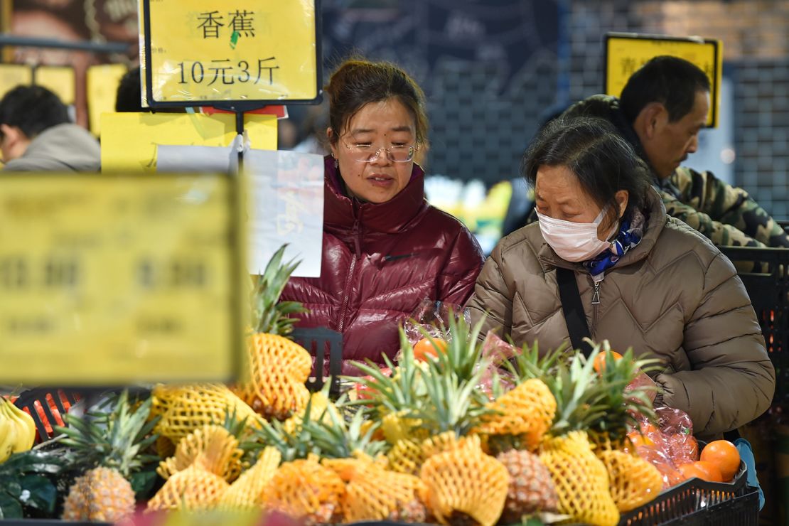 Shoppers browse for groceries at a supermarket in Nanjing, Jiangsu province.
