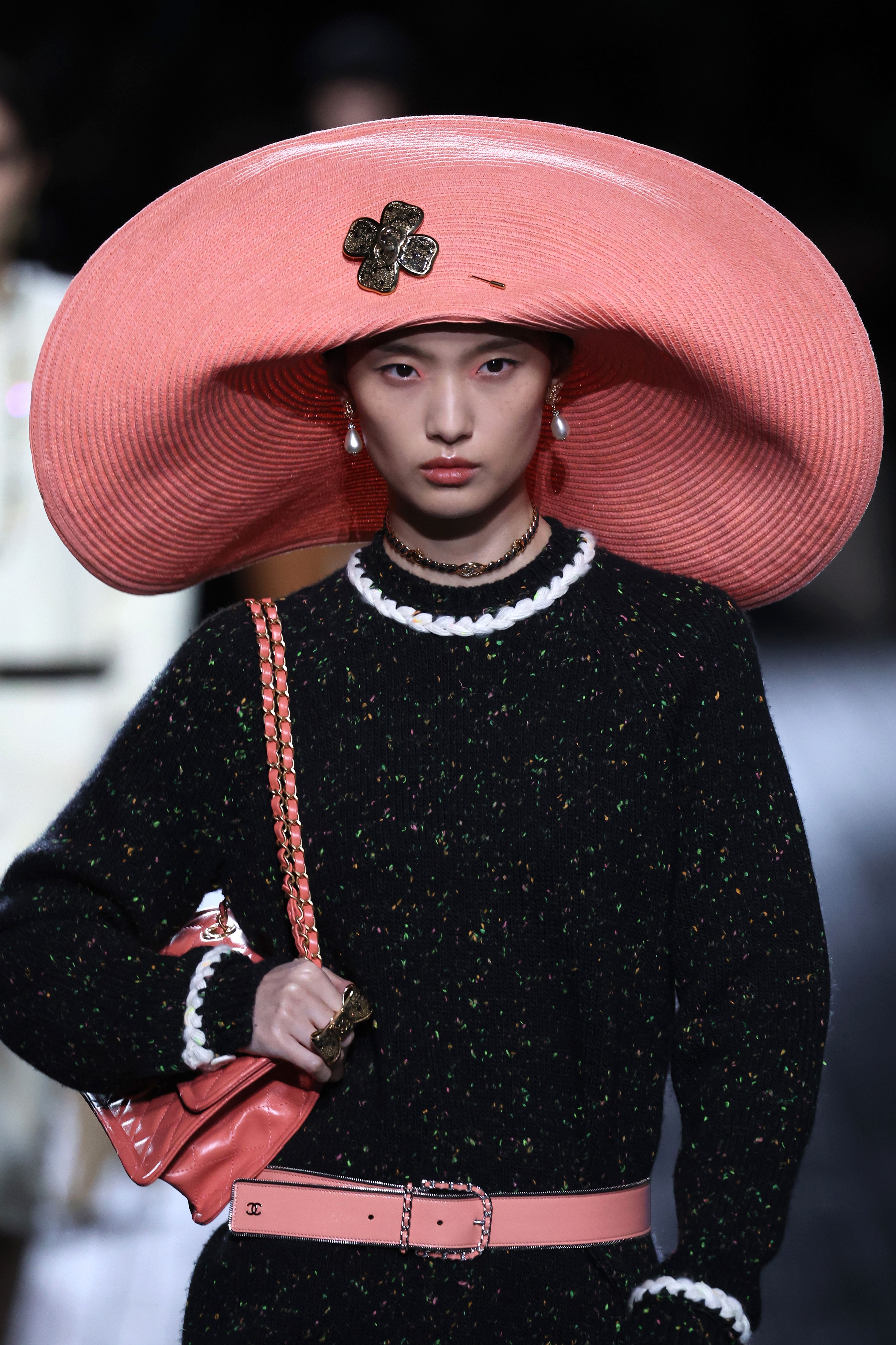 Oversized, floppy beach hats in a range of pink hues were a key feature at Chanel.