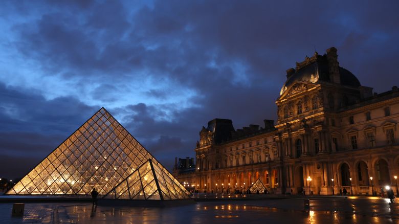 PARIS, FRANCE - MARCH 05: The Louvre museum is pictured at dusk on March 05, 2024 in Paris, France. (Photo by Pascal Le Segretain/Getty Images)