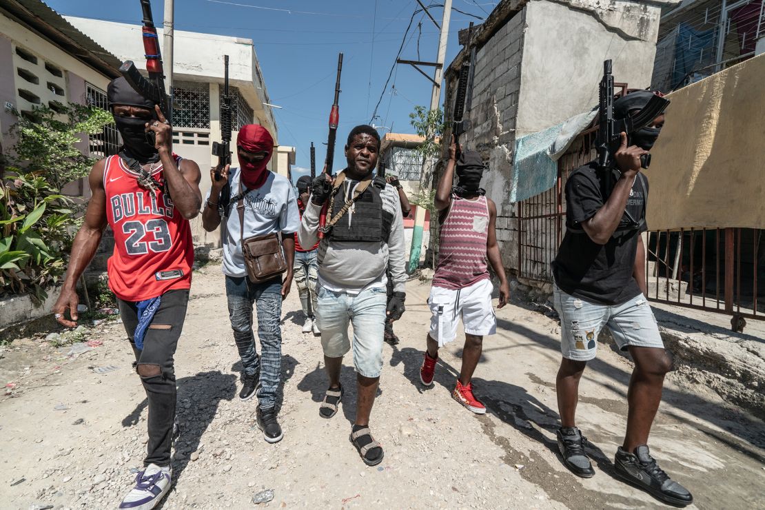 Gang Leader Jimmy 'Barbecue' Cherizier patrols the streets with G-9 federation gang members in the Delmas 3 area on February 22, 2024, in Port-au-Prince, Haiti. There has a been fresh wave of violence in Port-au-Prince where, according to UN estimates, gangs control 80% of the city.