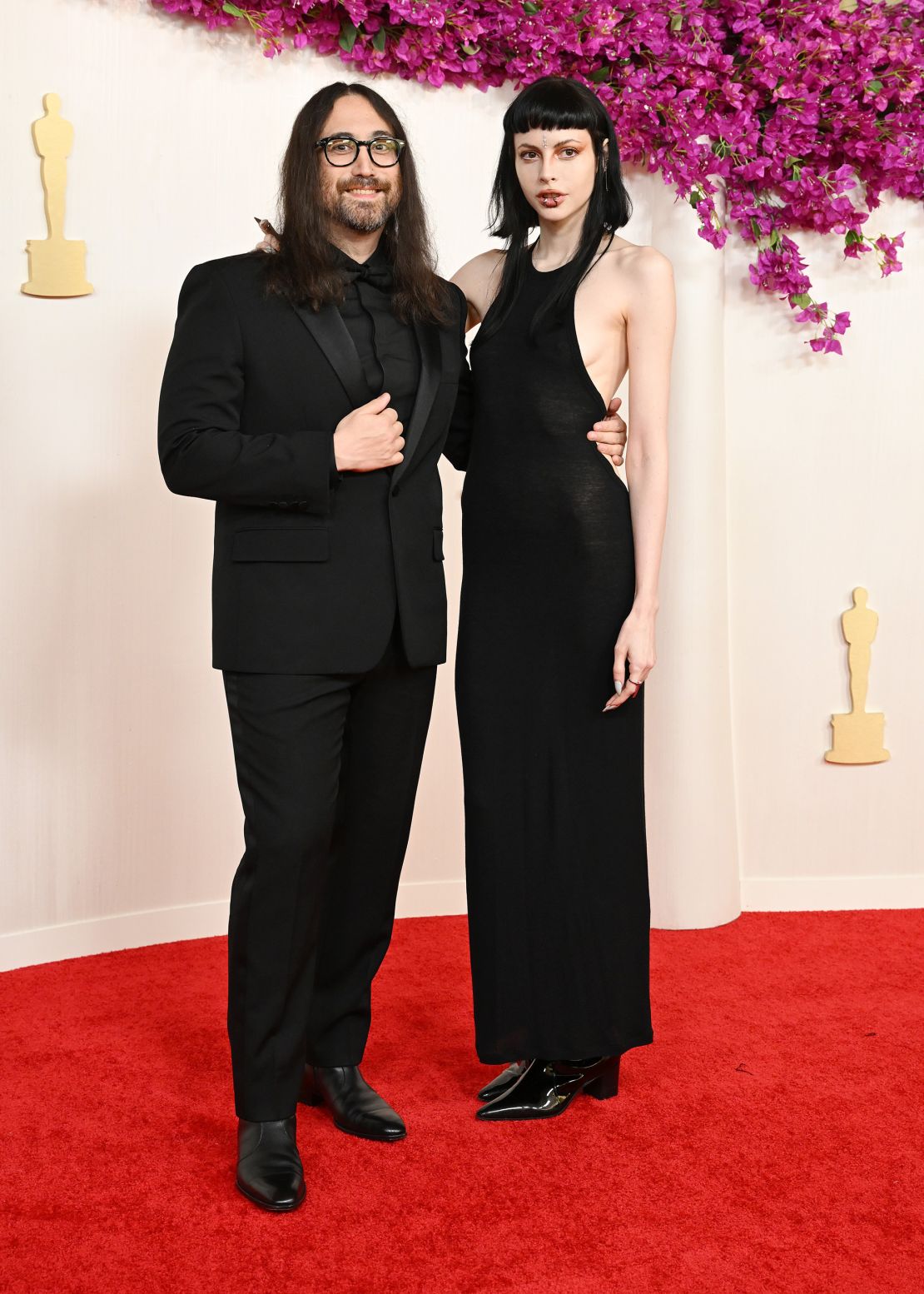 Sean Lennon, son of John Lennon and Yoko Ono, arrived with partner Kemp Muhl in matching black ensembles.