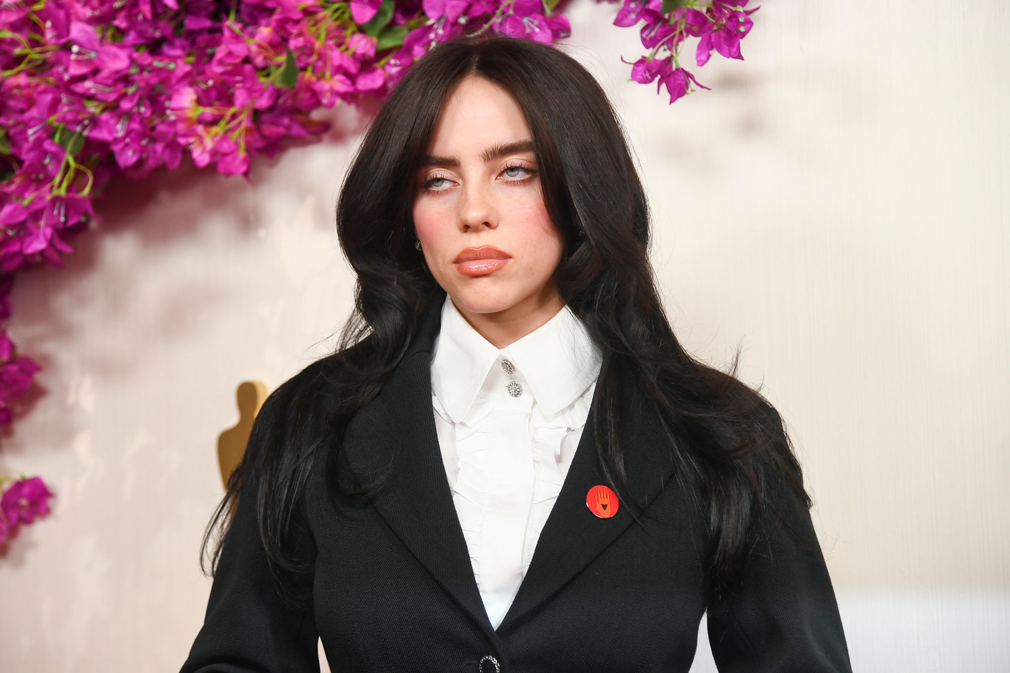 Billie Eilish at the 96th Academy Awards. Eilish wore a pin with a Chanel blazer calling for a ceasefire in Palestine.