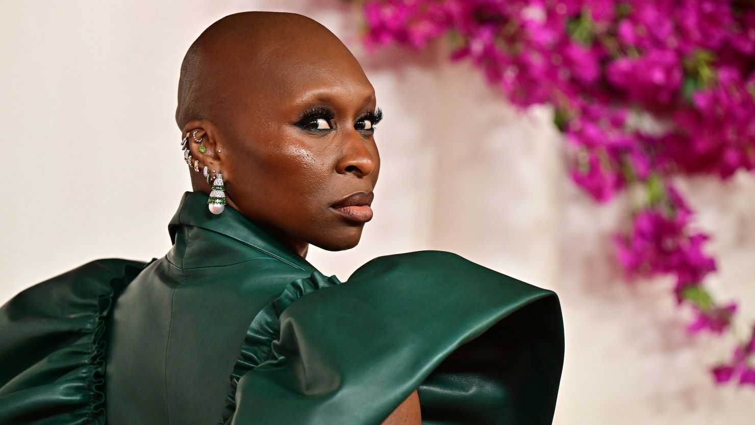 Cynthia Erivo, who plays Elphaba in the upcoming "Wicked" films, criticized new fan-made posters that hid parts of her face.