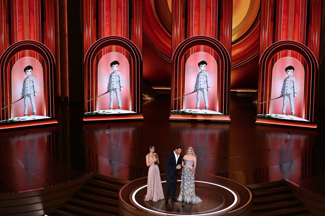 Chris Hemsworth and Anya Taylor-Joy present the award for Best Animated Feature Film for "The Boy and the Heron" on March 10, 2024.