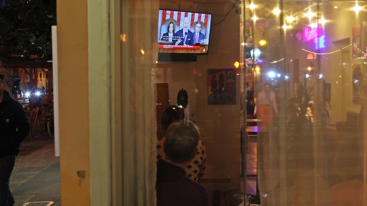 People in San Francisco watch President Joe Biden deliver the State of the Union on March 7, 2024.