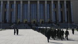 Military delegates arrive the closing session of the 14th National People's Congress (NPC) at the Great Hall of the People in Beijing on March 11, 2024. (Photo by WANG Zhao / AFP)