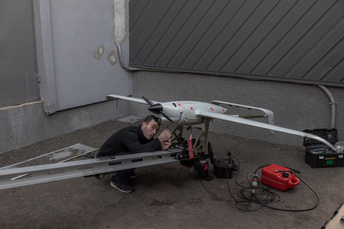 An employee works on a Raybird long-range surveillance drone at the Skyeton drone-manufacturing company in the Kyiv region on February 27.