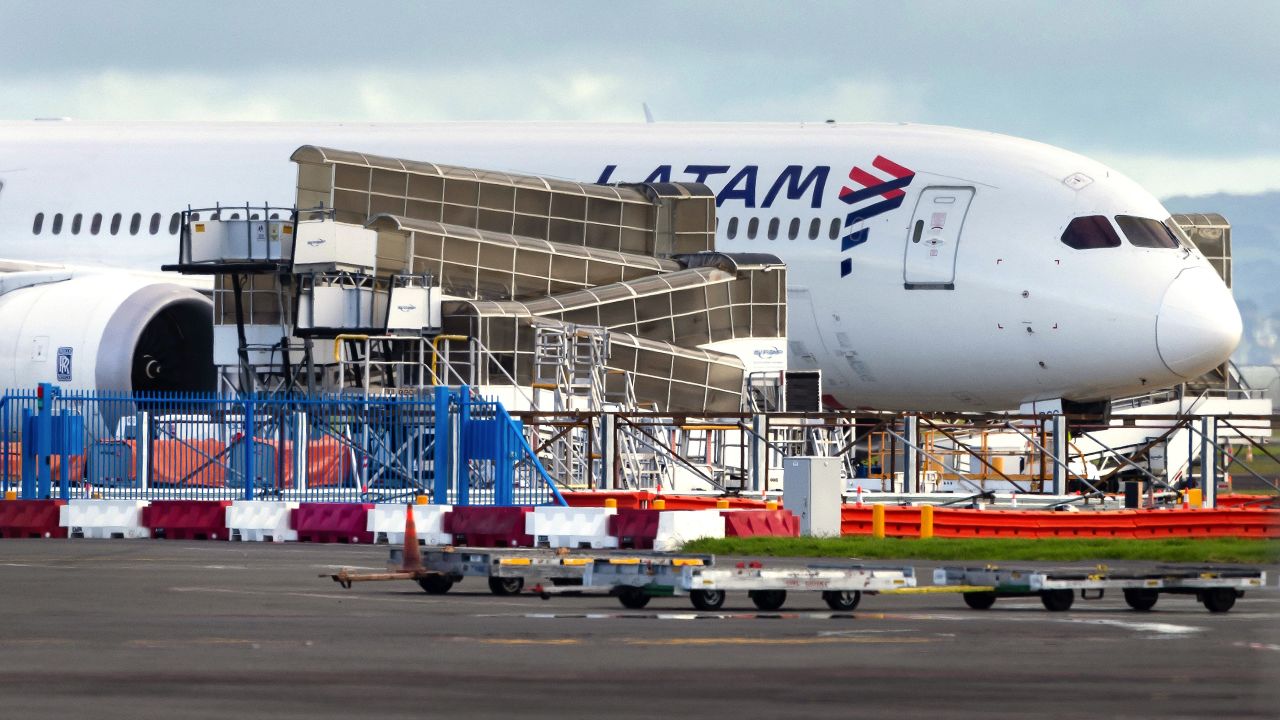 The LATAM Airlines Boeing 787 Dreamliner plane that suddenly lost altitude mid-flight a day earlier, dropping violently and injuring dozens of terrified travellers, is seen on the tarmac of the Auckland International Airport in Auckland on March 12, 2024. (Photo by BRETT PHIBBS / AFP) (Photo by BRETT PHIBBS/AFP via Getty Images)