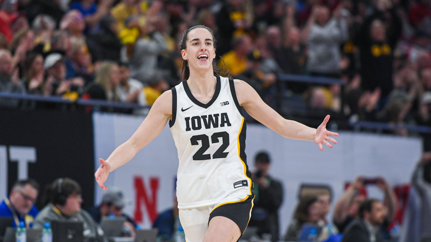 Caitlin Clark of the Iowa Hawkeyes reacts after breaking the NCAA single-season three-point shot record on March 8, 2024, in Minneapolis.