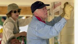 LAGRANGE, GA - JUNE 10:  Former US President Jimmy Carter and former First Lady Rosalyn Carter attach siding to the front of a Habitat for Humanity home being built June 10, 2003 in LaGrange, Georgia. More than 90 homes are being built in LaGrange; Valdosta, Georgia; and Anniston, Alabama by volunteers as part of Habitat for Humanity International's Jimmy Carter Work Project 2003.  (Photo by Erik S. Lesser/Getty Images)