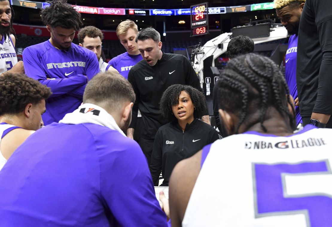 Harding (middle) talks to her Kings players during the game against the Ontario Clippers.