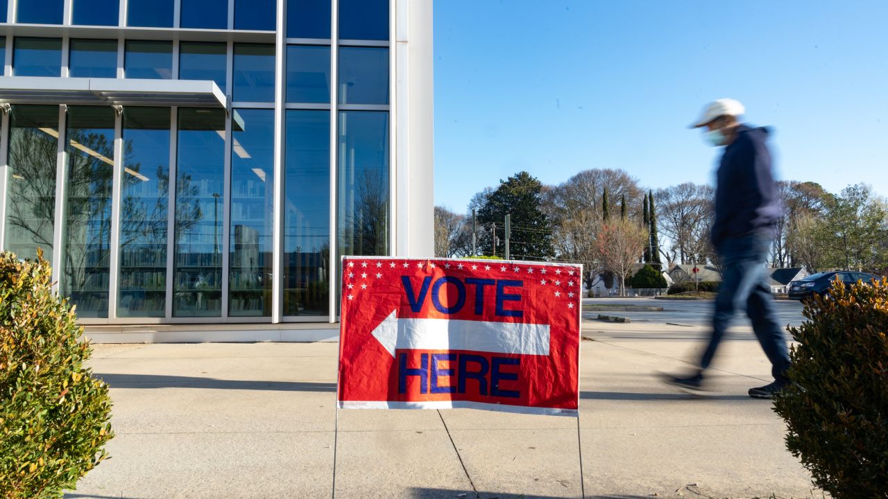 Voters cast ballots in Georgia's primary election on March 12, 2024, at Metropolitan Library in Atlanta.