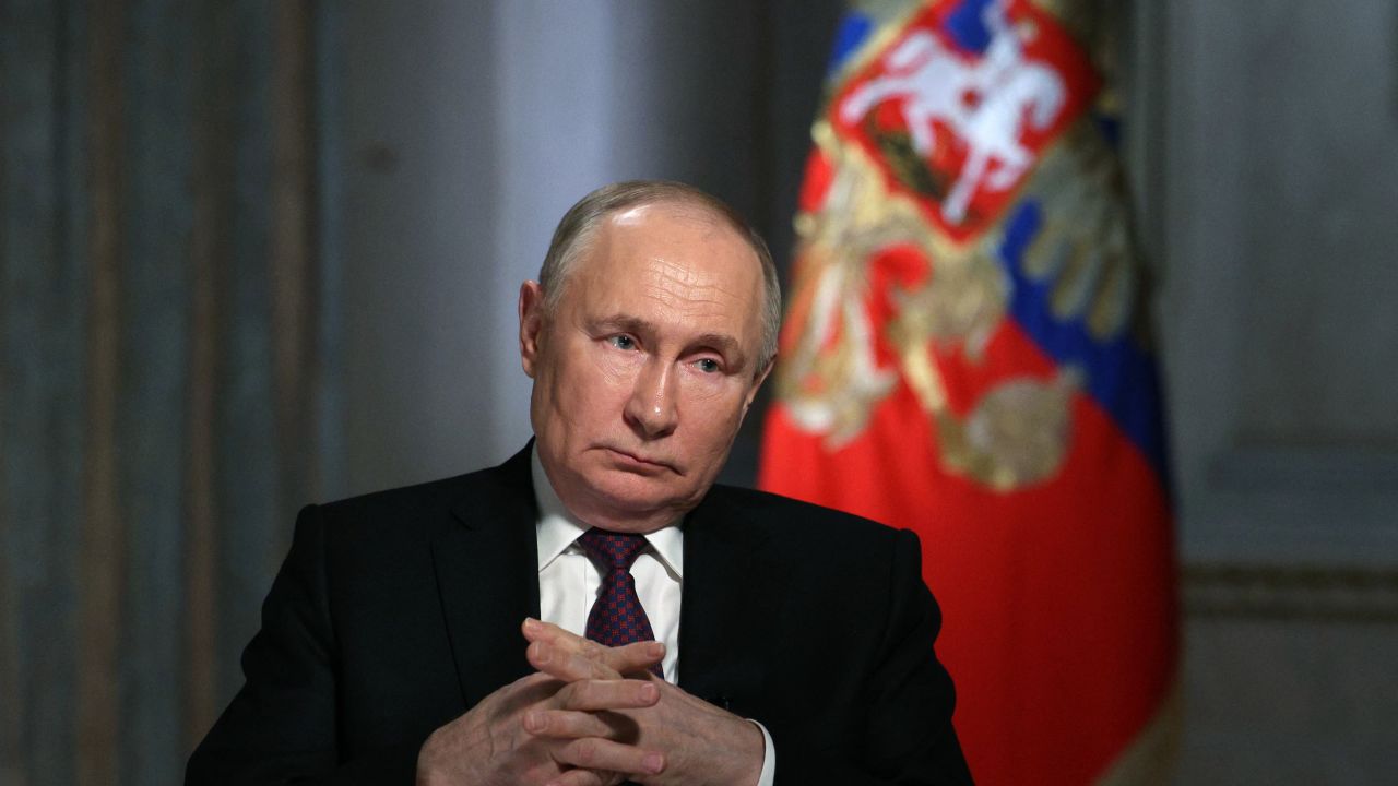 TOPSHOT - In this pool photograph distributed by Russia's state agency Sputnik, Russian President Vladimir Putin gives an interview to TV host and Director General of Rossiya Segodnya (RIA Novosti) news agency Dmitry Kiselyov (not pictured) at the Kremlin in Moscow on March 12, 2024. (Photo by Gavriil GRIGOROV / POOL / AFP) (Photo by GAVRIIL GRIGOROV/POOL/AFP via Getty Images)          