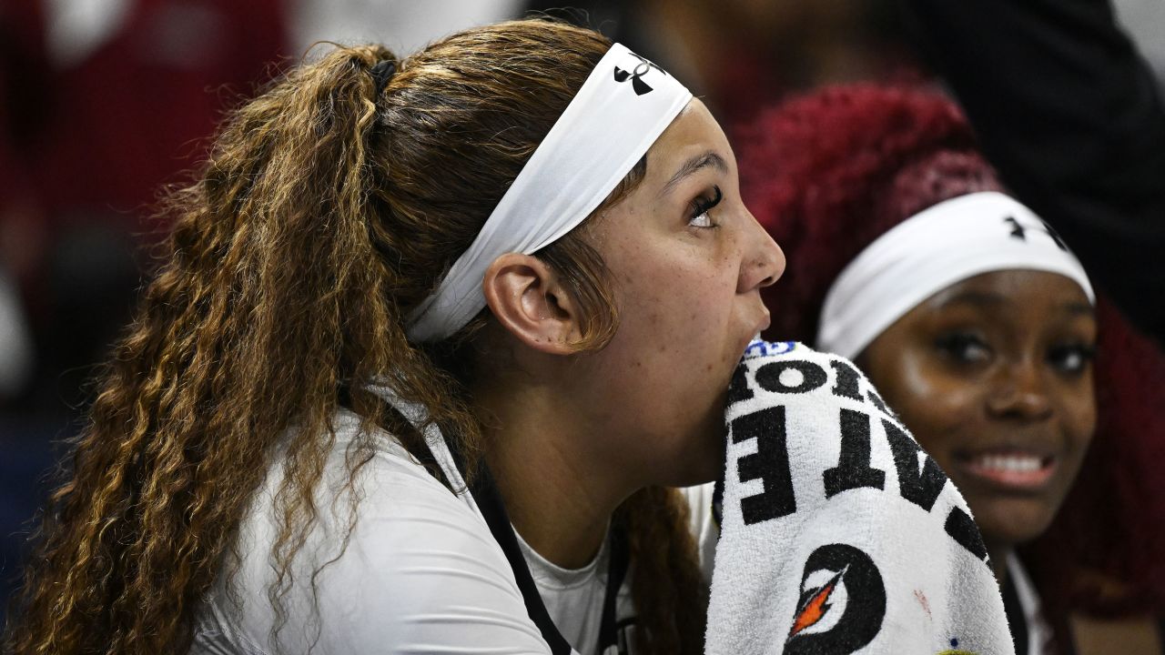 GREENVILLE, SOUTH CAROLINA - MARCH 10: Kamilla Cardoso #10 of the South Carolina Gamecocks holds a towel to her lip after an altercation against the LSU Lady Tigers in the fourth quarter during the championship game of the SEC Women's Basketball Tournament at Bon Secours Wellness Arena on March 10, 2024 in Greenville, South Carolina. (Photo by Eakin Howard/Getty Images)