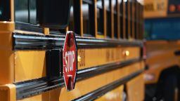 An electric bus is parked during an event to highlight funding for electric school buses at the Coral Reef High School in Richmond Heights, Florida, on March 11, 2024.