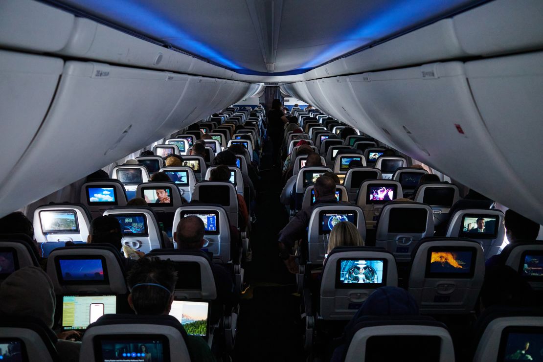 Passengers on a Boeing 737 Max 8 plane during a United Airlines flight departing from Newark Liberty International Airport in Newark, New Jersey, on March 13, 2024.