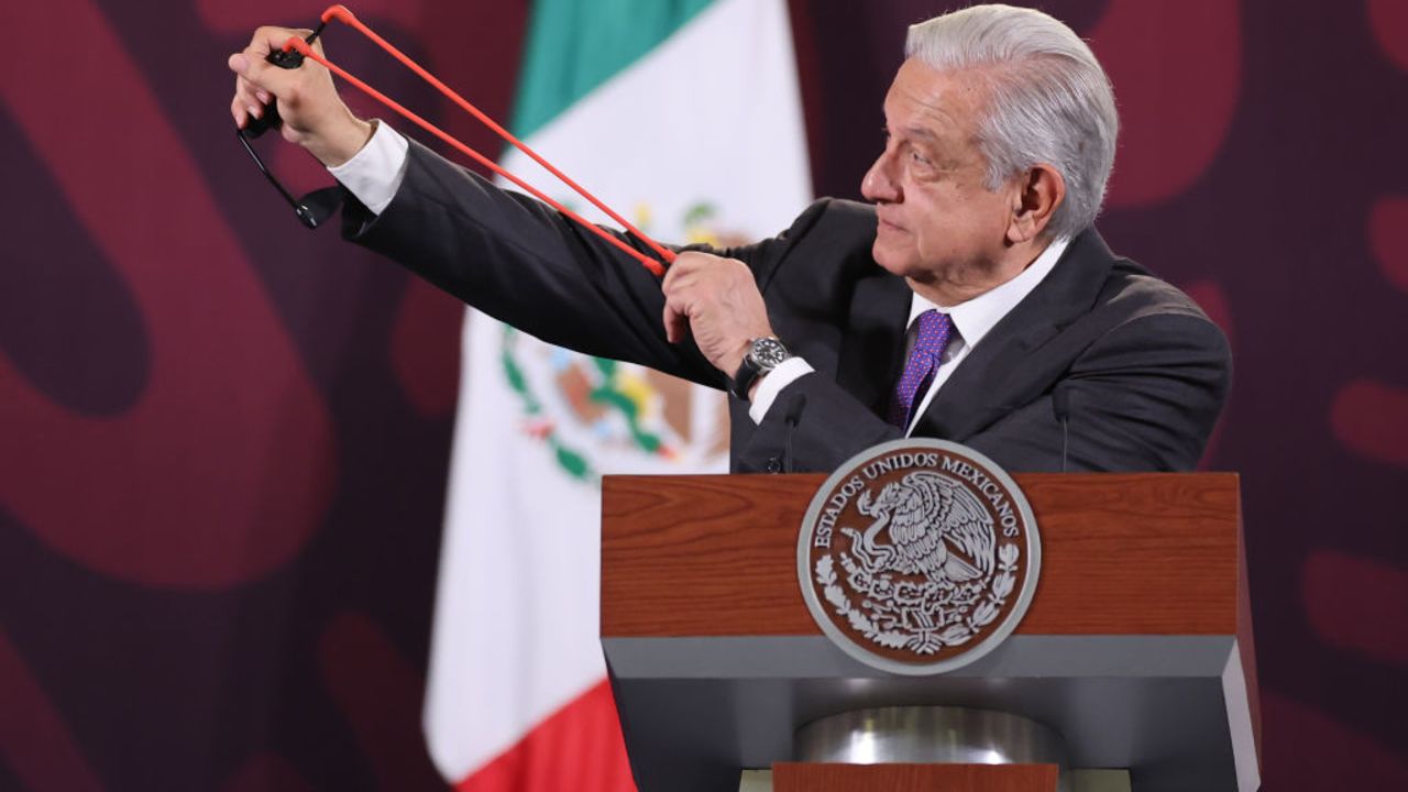 MEXICO CITY, MEXICO - MARCH 12: President of Mexico Andres Manuel Lopez Obrador shows a slingshot, stones and pellets allegedly used by the students of Ayotzinapa in the protest held on March 6 where they knocked down a door of the National Palace as part of the daily briefing at Palacio Nacional on March 12, 2024 in Mexico City, Mexico. (Photo by Hector Vivas/Getty Images)