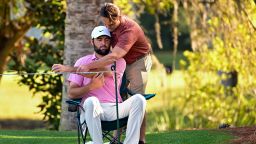 PONTE VEDRA BEACH, FLORIDA - MARCH 15: Scottie Scheffler is looked for an injury before playing the 14th hole during the second round of THE PLAYERS Championship at Stadium Course at TPC Sawgrass on March 15, 2024 in Ponte Vedra Beach, Florida. (Photo by Ben Jared/PGA TOUR via Getty Images)