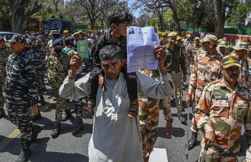 Hindu Refugees from Pakistan and Afghanistan stage a protest against Congress Party over alleged Anti-CAA remarks near AICC headquarters in New Delhi, India, on March 15, 2024.