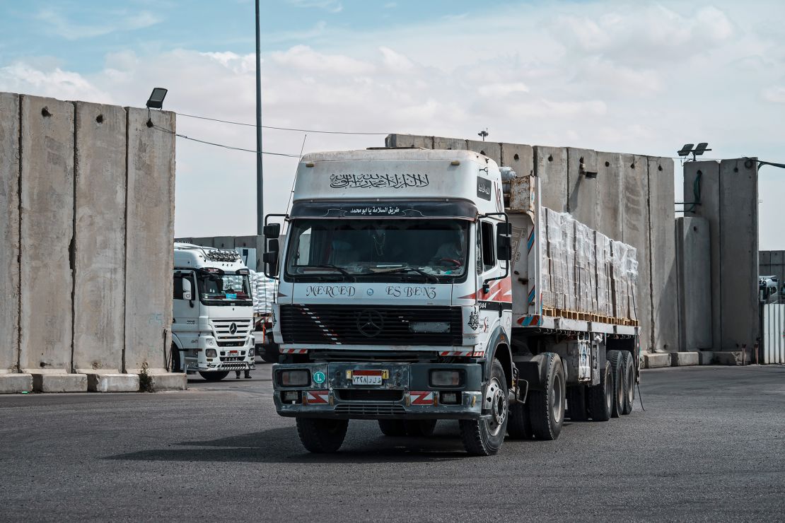 Cargo trucks carrying humanitarian aid move the security inspections before crossing into the Gaza Strip, in Kerem Shalom, Israel. March 14, 2024. 